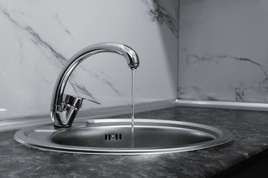 Modern kitchen sink faucet detail
